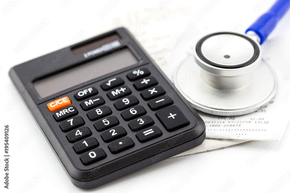 Stethoscope, receipt and calculator, concept business financial Stethoscope, receipt and calculator, concept business financial