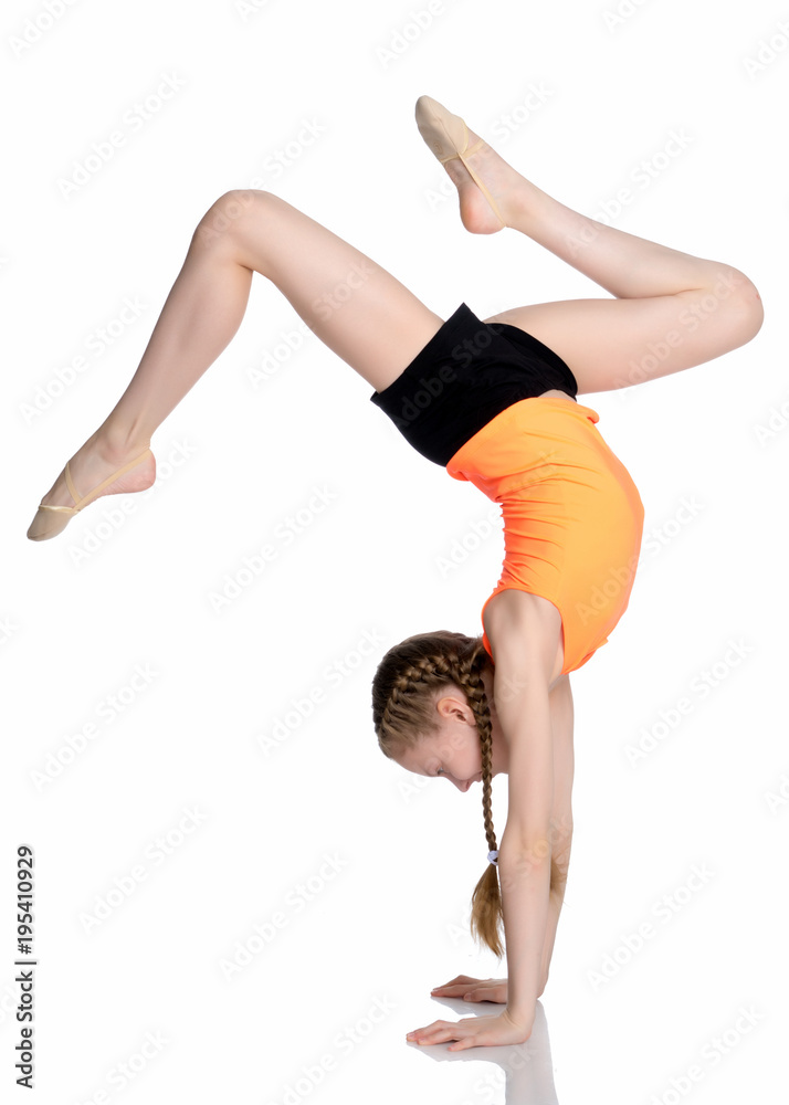 The gymnast performs a handstand with bent legs.