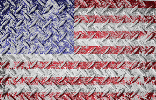 Red white and blue american old glory flag. Rough textured metal diamond plate background with american flag layered. 