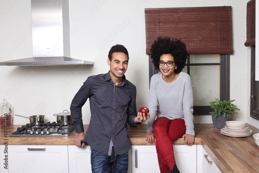 Afro couple in the kitchen Afro couple in the kitchen
