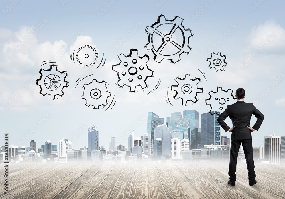 Cogwheel engine drawn on screen as symbol for teamwork and cooperation Cogwheel engine drawn on screen as symbol for teamwork and cooperation