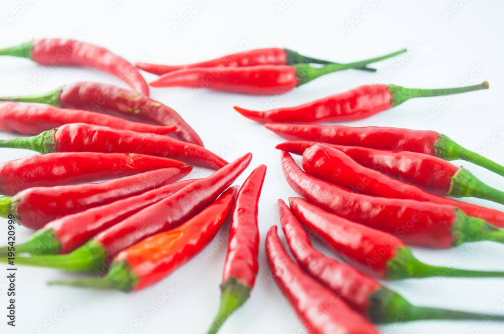 Group of three chili peppers isolated on white background as package design element
