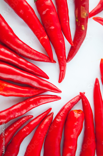 Group of three chili peppers isolated on white background as package design element 