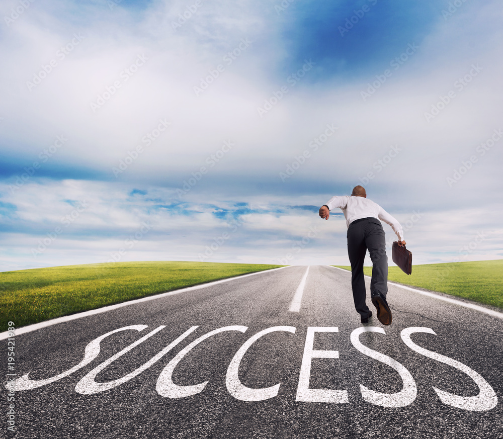 Man runs on a success way. Concept of successful businessman and company startup Man runs on a success way. Concept of successful businessman and company startup
