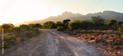 Sunrise on a farm in the Little Karoo region, over the Cockscomb Mountains in the Eastern Cape, South Africa photo