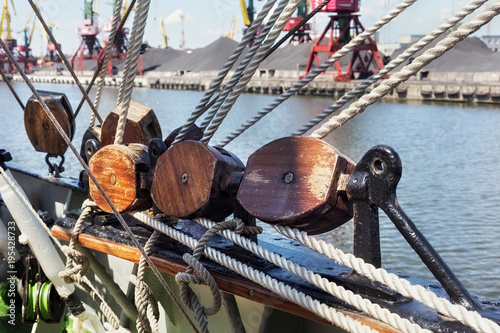 Wooden blocks as part of rigging on a sailing ship. photo