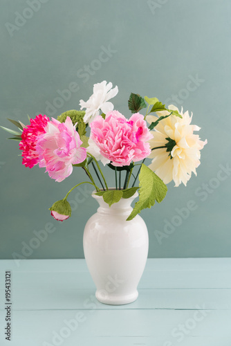 Crepe paper flower bouquet with peonies and dahlia in a vase