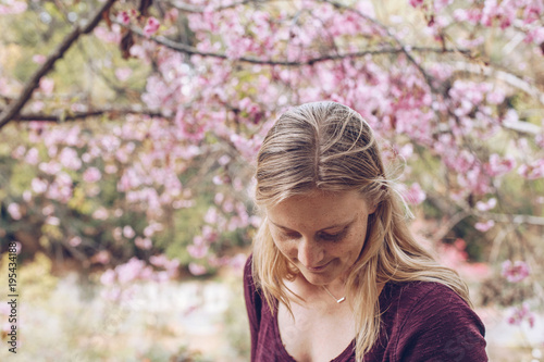 Blonde Woman Portrait with Cherry Blossoms