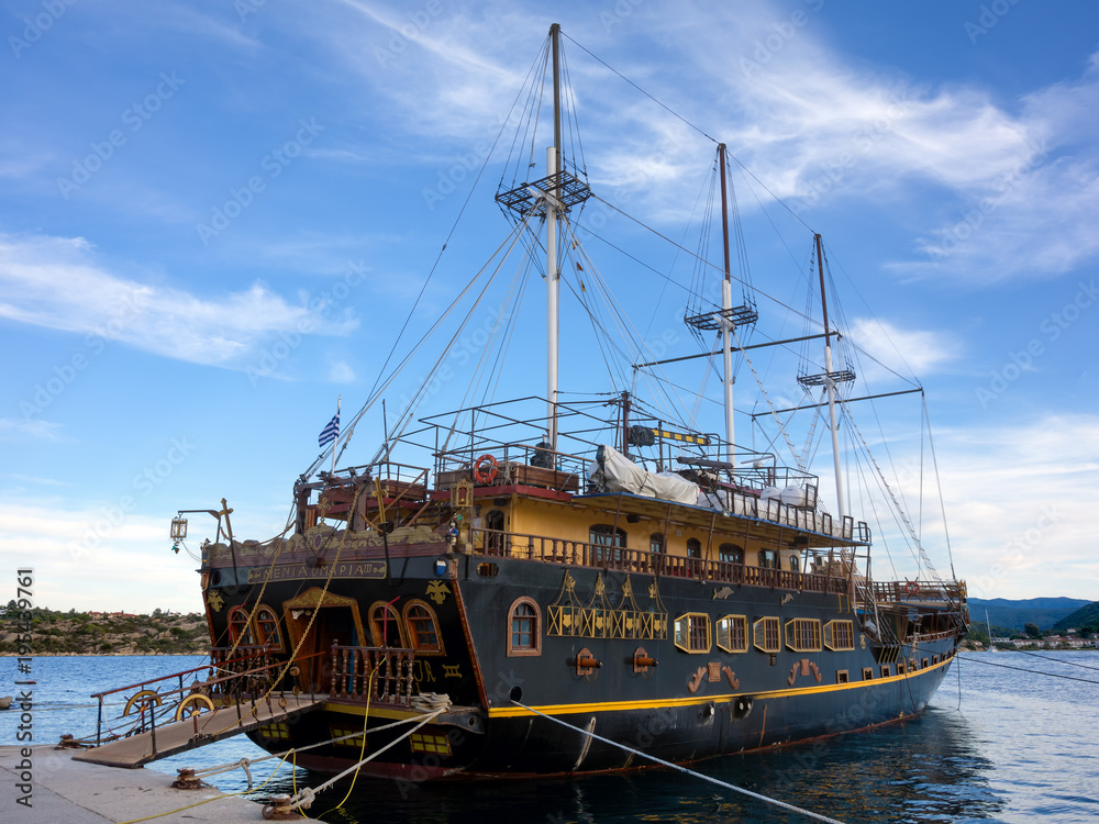 A touring boat for tourists in the harbor of Ormos Panagias, Sithonia, Greece