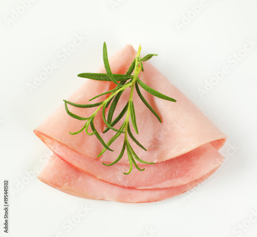 thin slice of ham and rosemary