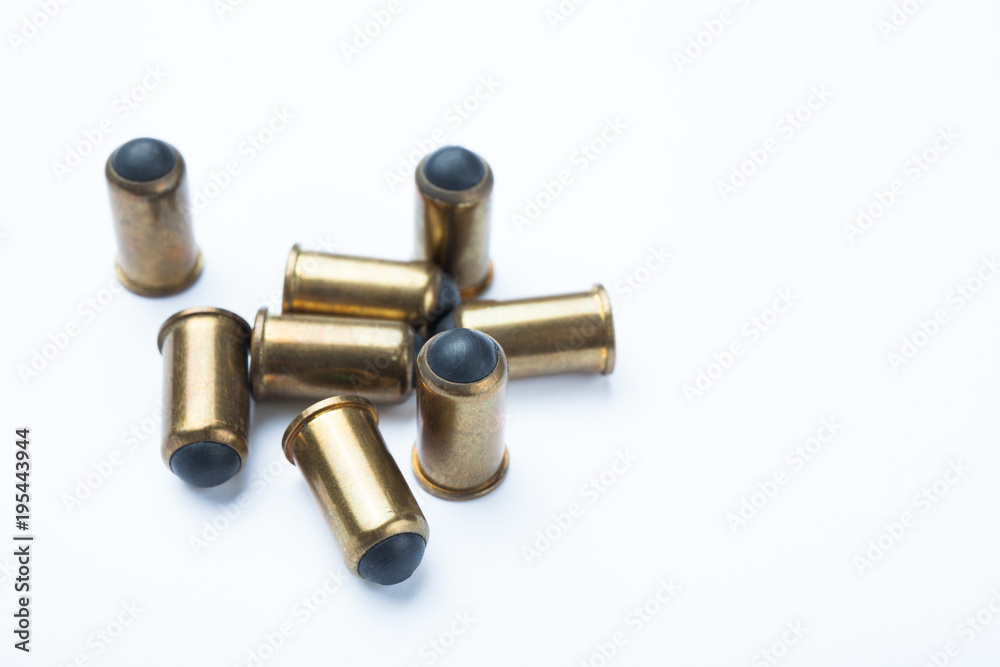 Set of rubber bullets on a white background. Empty space for text. Set of rubber bullets on a white background. Empty space for text.