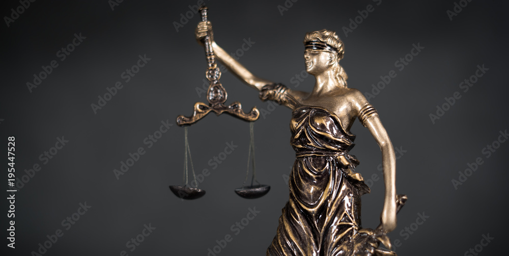 Law and Justice concept. Gray stone background, reflections on the floor, place for typography. Courtroom theme.