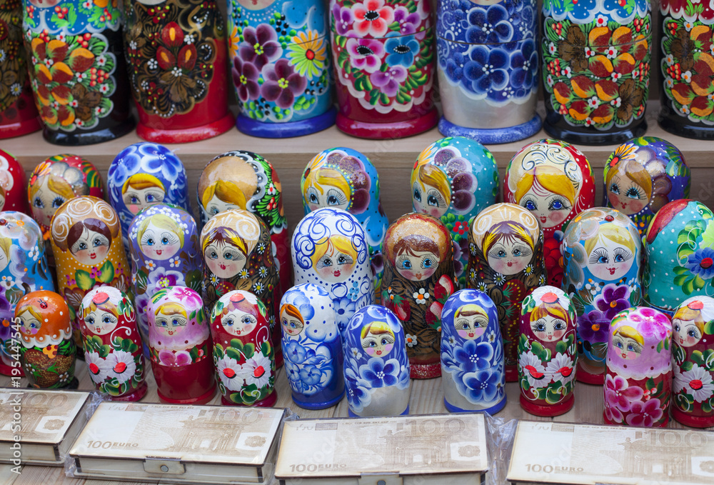 beautiful colourful wooden dolls matryoshka at market