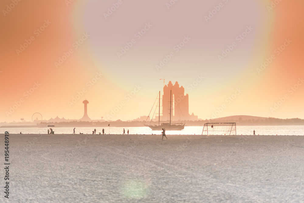 beach shot from the sand. orange sunset
