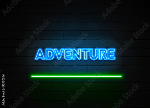 Adventure neon sign mounted on brick wall.