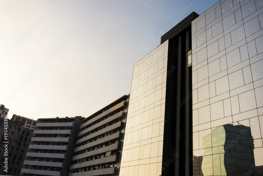 background of concrete and glass buildings