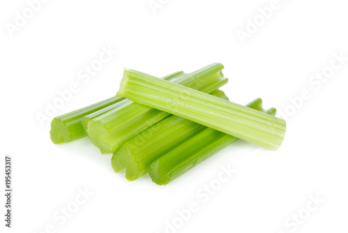 portion cut fresh celery stem on white background