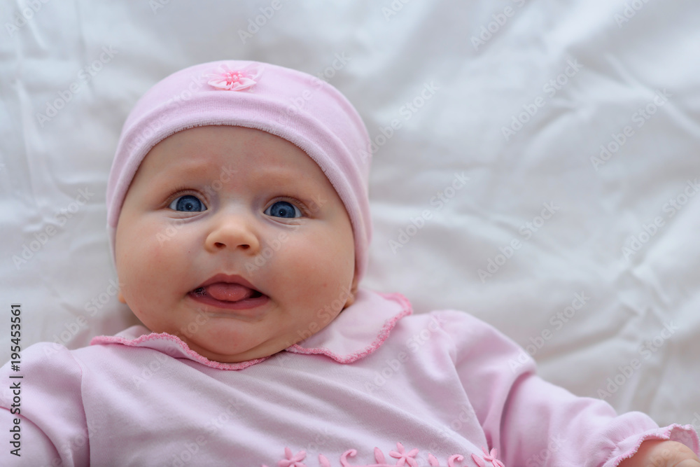 Cute baby girl portrait. Sweet little girl All dressed in Pink cloth Cute baby girl portrait. Sweet little girl All dressed in Pink cloth