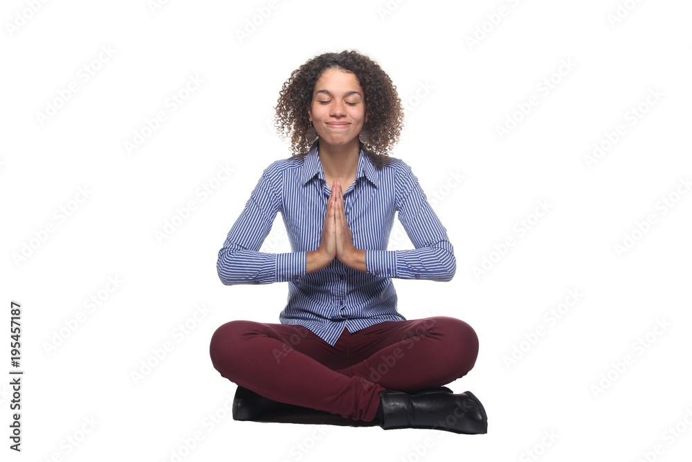 Afro woman sitting on the floor