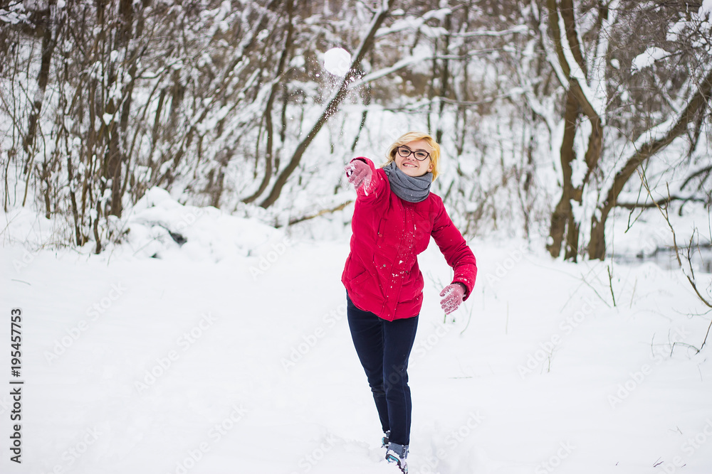 Happy woman in a winter forest Happy woman in a winter forest