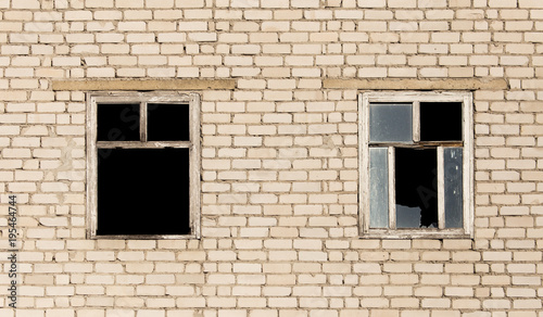 Windows in a brick house under construction