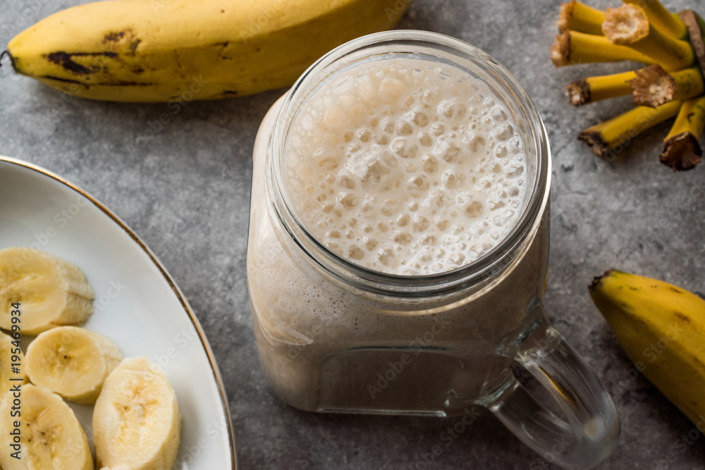 Milky Banana Smoothie in Mason Jar with Milk (Milkshake) Milky Banana Smoothie in Mason Jar with Milk (Milkshake)