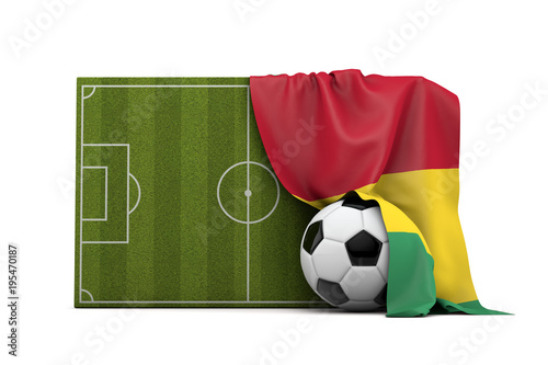Guinea country flag draped over a football soccer pitch and ball. 3D Rendering © ink drop