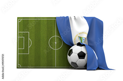 Nicaragua country flag draped over a football soccer pitch and ball. 3D Rendering © ink drop