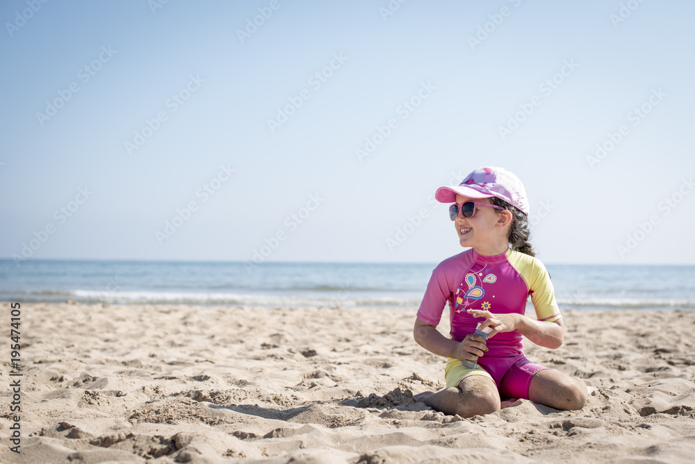 Little girl posing beach