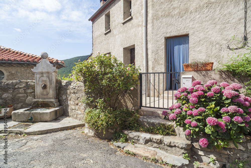 Village view, small and picturesque french village,member of Les Plus Beaux Villages de France (The most beautiful villages of France).Mosset,Pyrenees-Orientales,Occitanie.France.