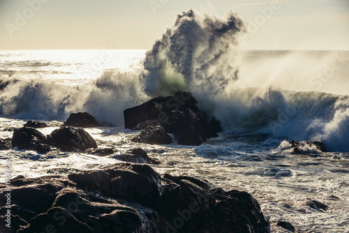 Big waves on Atlantic Ocean seen from beach in Porto, Portugal