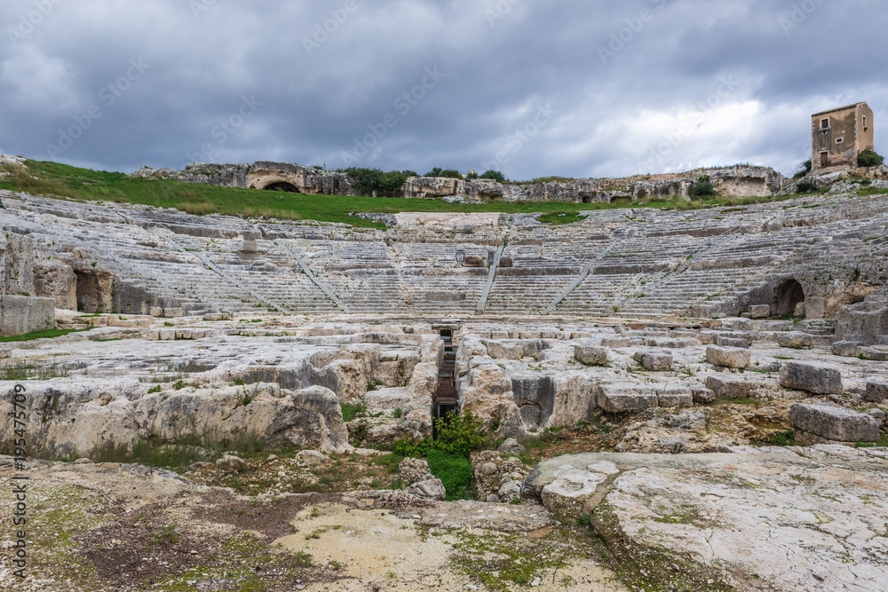 Ruins of Greek theater in Neapolis Archaeological Park in Syracuse, Sicily Island of Italy Ruins of Greek theater in Neapolis Archaeological Park in Syracuse, Sicily Island of Italy