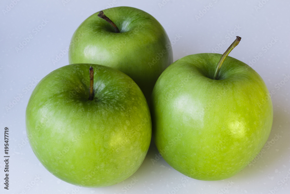 Closeup of Green Apples on White Background. Closeup of Green Apples on White Background.