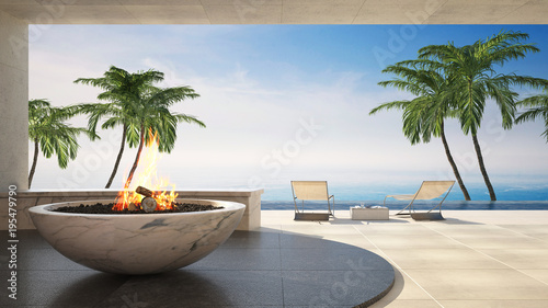 Burning fire on a luxury tropical deck photo