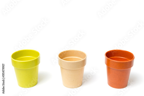 Recycled materials biodegradable tree pot isolated on a white background 