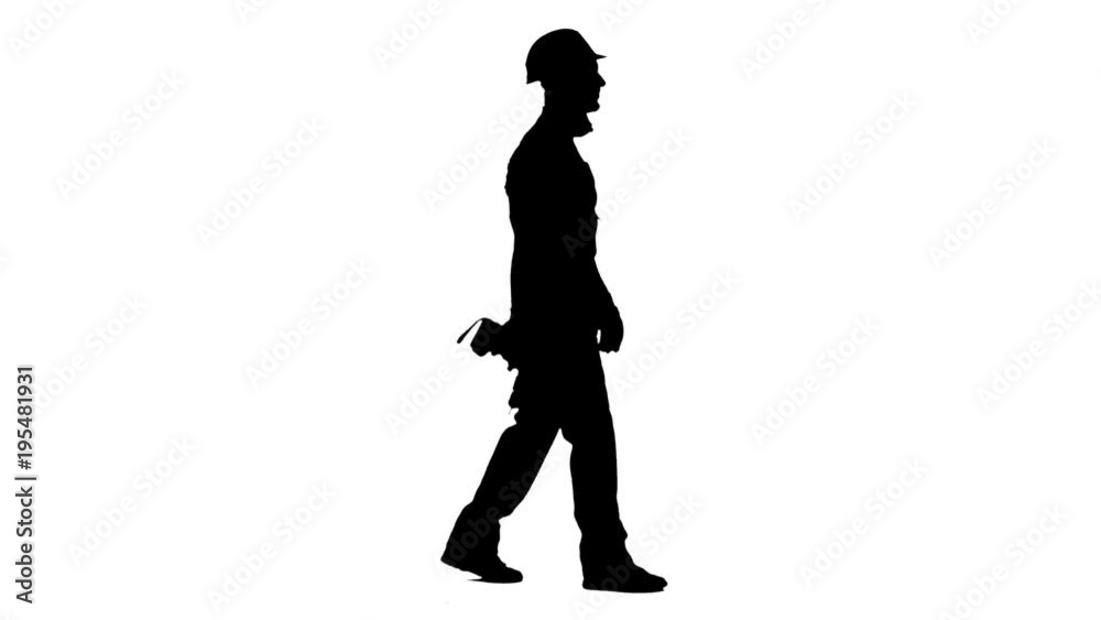Man working from a construction site comes with a drill in his hands. White background. Silhouette. Side view Man working from a construction site comes with a drill in his hands. White background. Silhouette. Side view