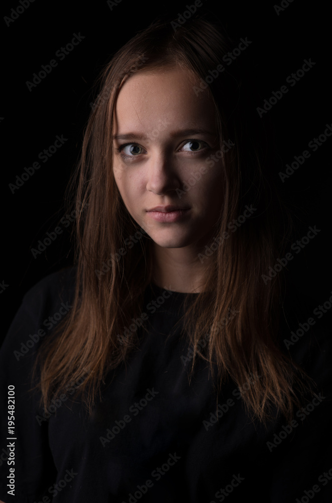 portraits of a young and beautiful girl in the Studio