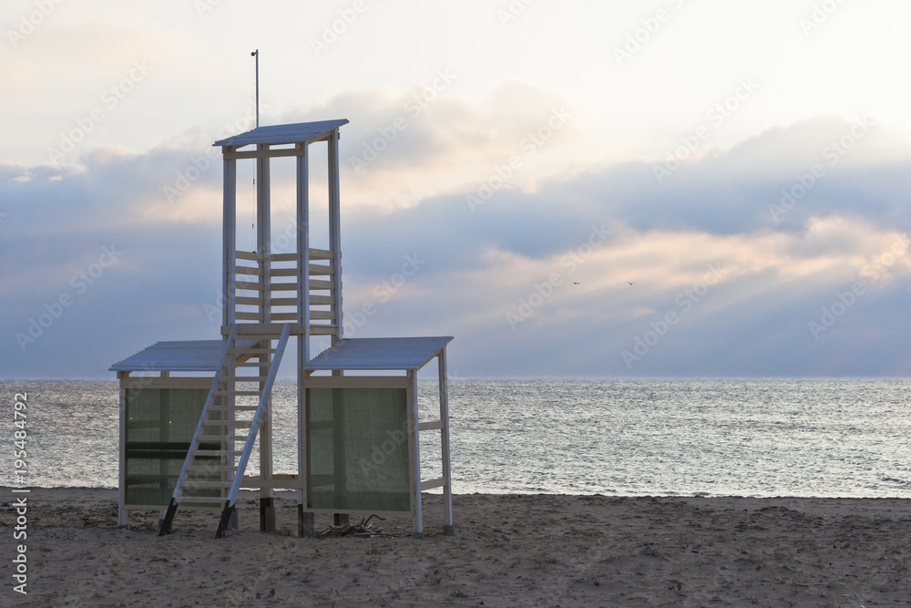 Rescue tower on a deserted beach in winter in the resort village of Vitino in the Saki district of Crimea, Russia