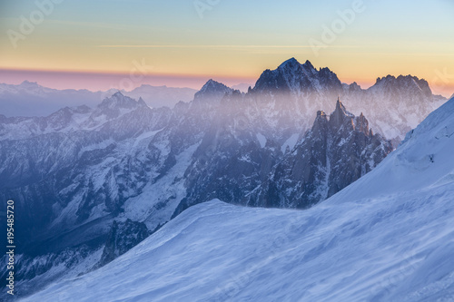 Panoramic view on rocky peaks of Aiguille du Midi at the sunrise © almostfuture