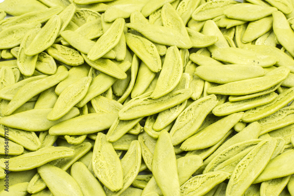 Raw Olive leaves pasta with spinach background wallpaper. Raw Olive leaves pasta with spinach background wallpaper.