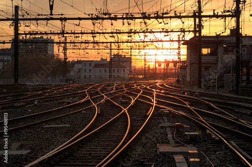 Empty railroad tracks during a nice sunrise at Gare de Lyon-Perrache. Lyon, France.