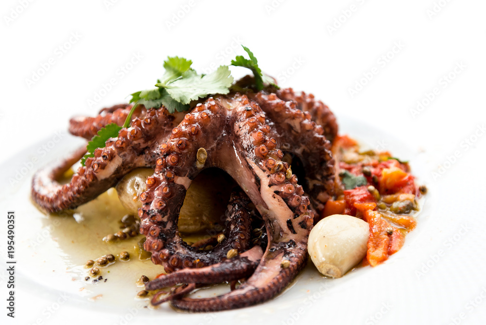Mediterranean Octopus with vegetables and potatoes Mediterranean Octopus with vegetables and potatoes