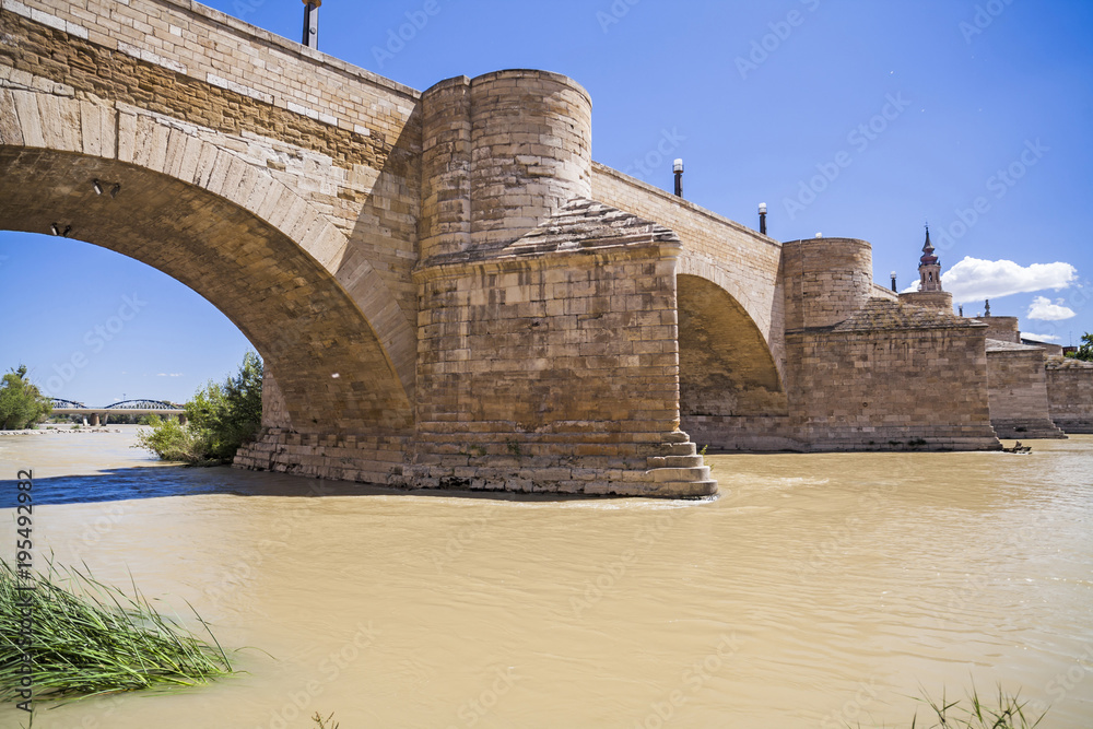 Stone bridge, Puente de piedra over Ebro river, Zaragoza, Spain.