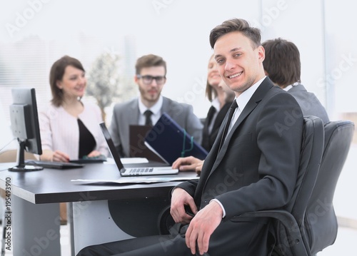 business team with a senior Manager in the foreground