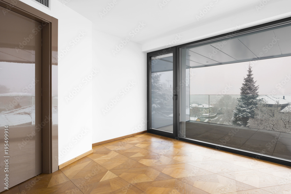 Obraz premium Empty room. It's snowing outside.