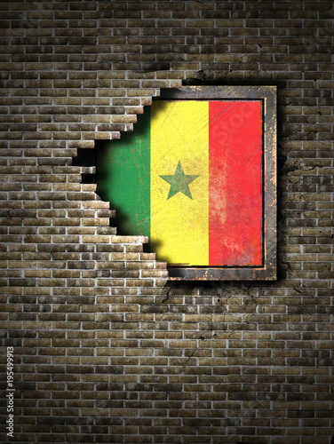 Old Senegal flag in brick wall photo