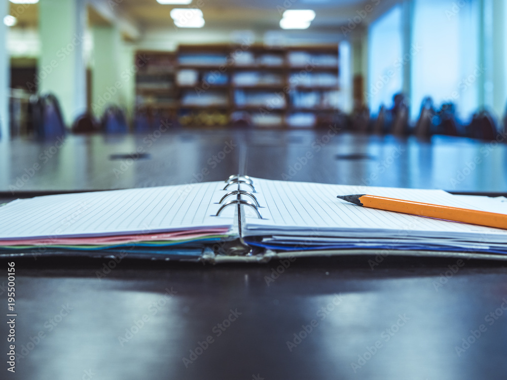 close up notebook on the meeting table in office close up notebook on the meeting table in office