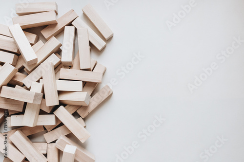 Pile of small wooden blocks for Jenga table game photo