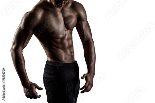 Highly retouched fitness model and bodybuilder, Looking and posing abs and chest. concept of power and strength. Isolated on white background. Copy space.