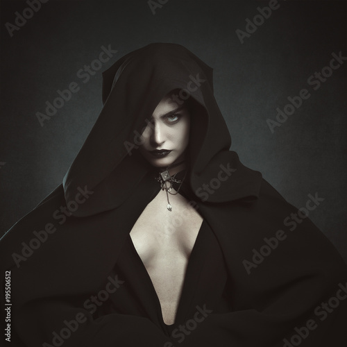 Mysterious hooded vampire woman
